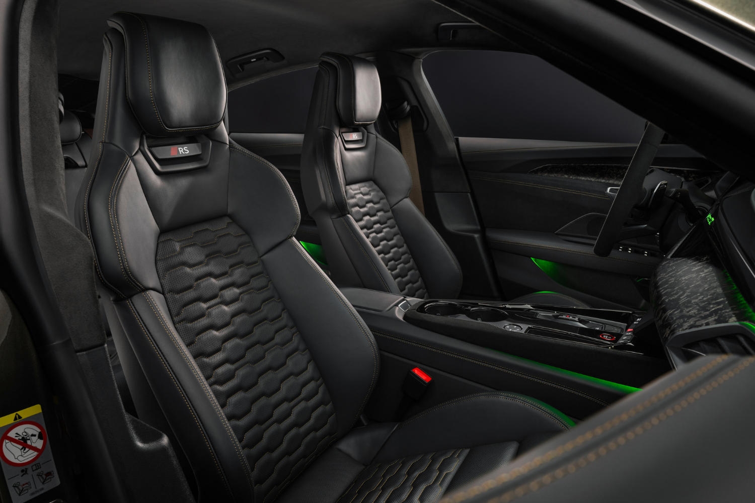 The new Audi RS e-tron GT Performance black leather interior with green interior lights.