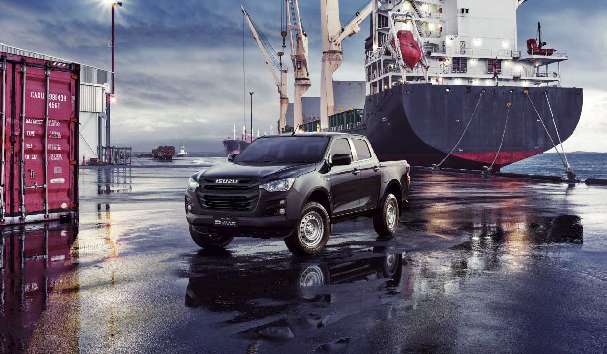 Black Isuzu by the ship