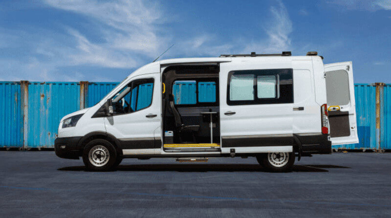 Side view of Ford Transit One Stop Shop with side door open