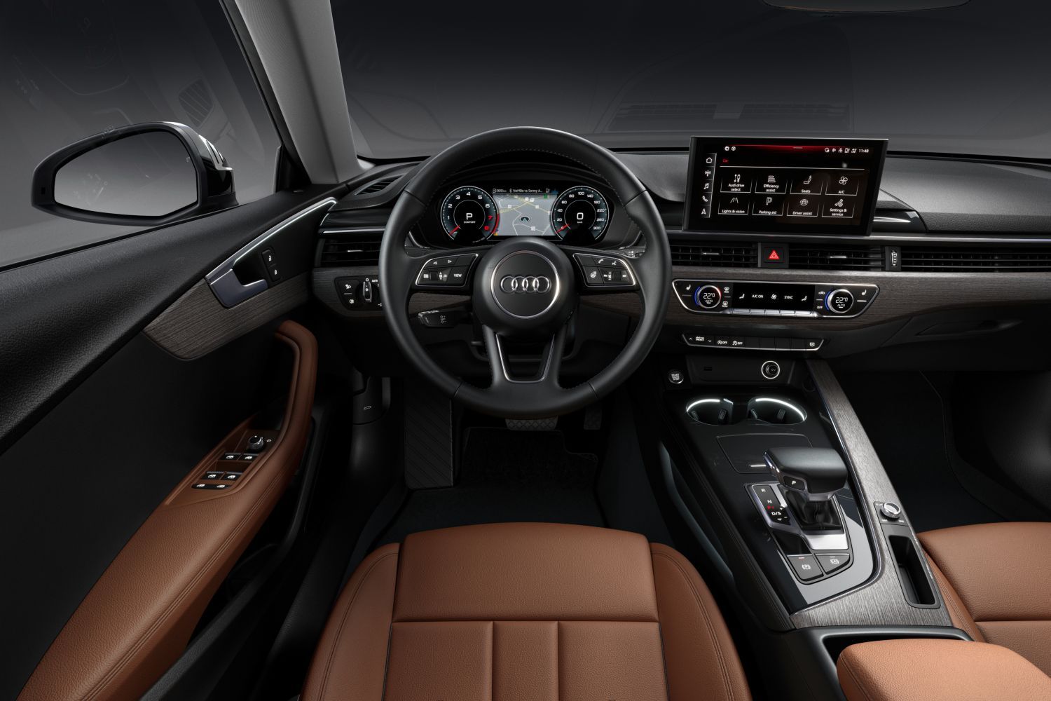 New Audi A5 Sportback interior displayed, we see the classic Audi steering wheel paired with the new digital cockpit and infotainment system.