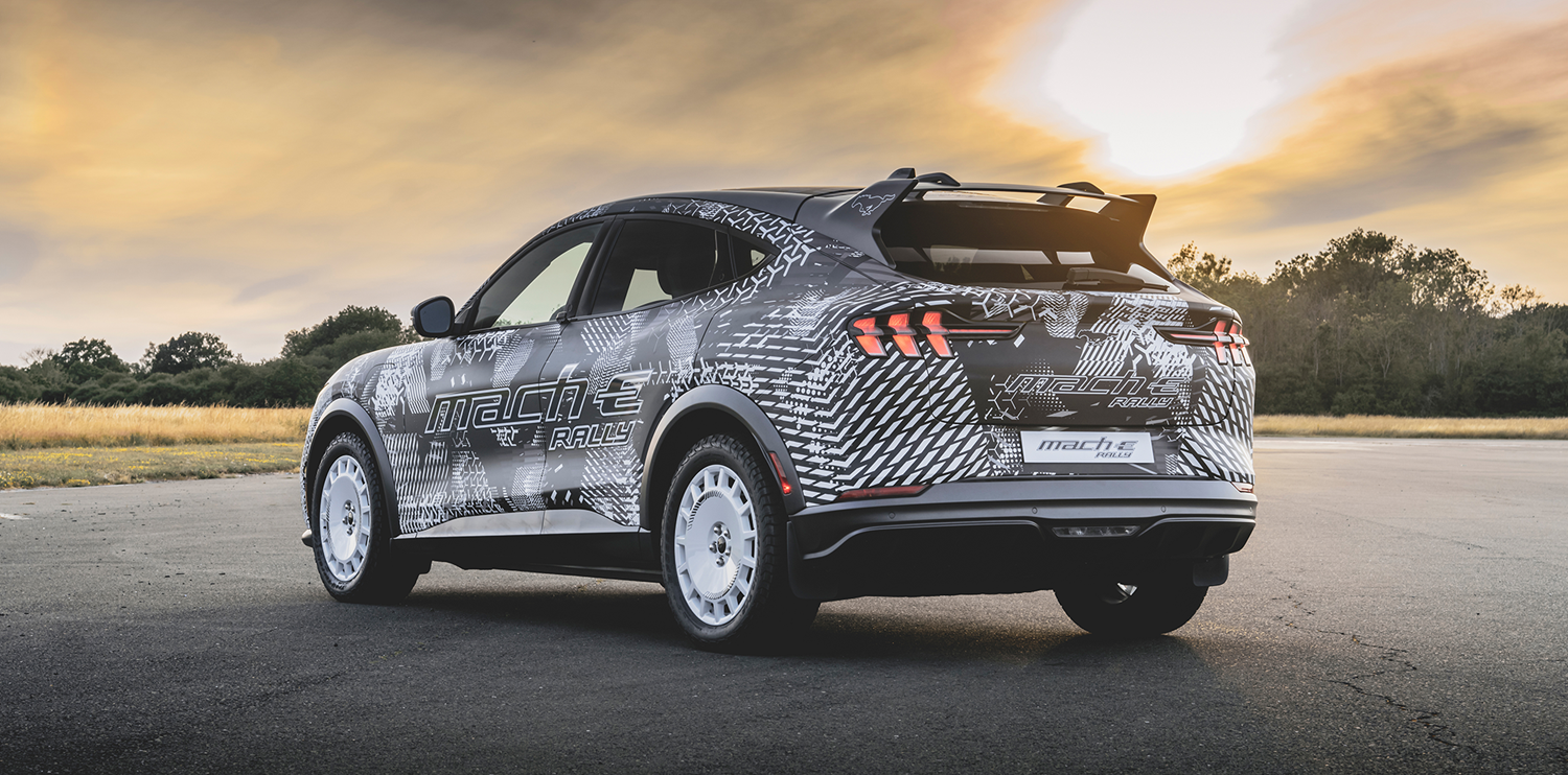 Black Mach-E Rally covered in white decals