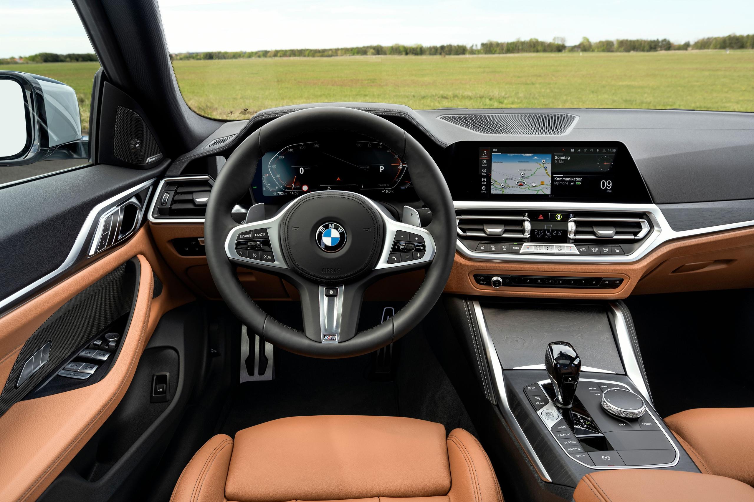 New BMW 4 Series Gran Coupe, drivers side image of steering controls, digital cockpit and infotainment system