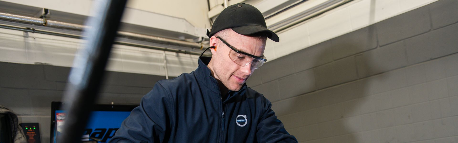 Agnew Belfast Volvo Parts Specialist inspects a used Volvo for parts replacement