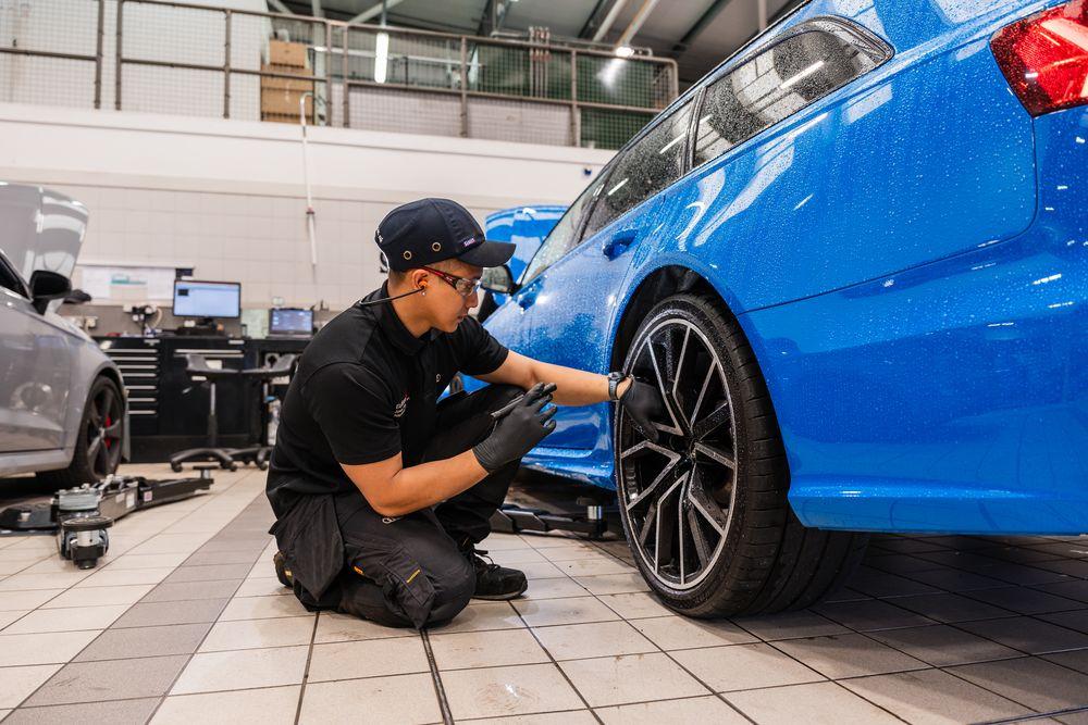 Audi vehicle is inspected during routine maintenance