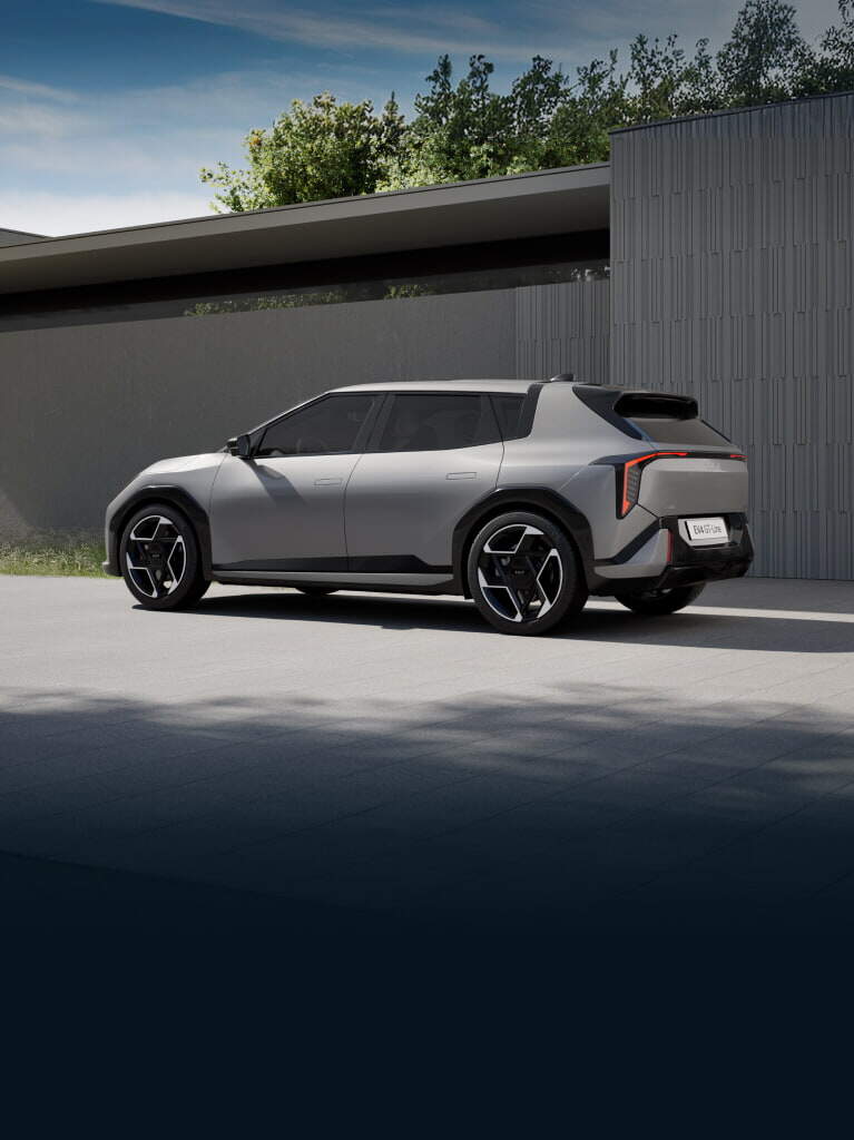 parked white kia ev4