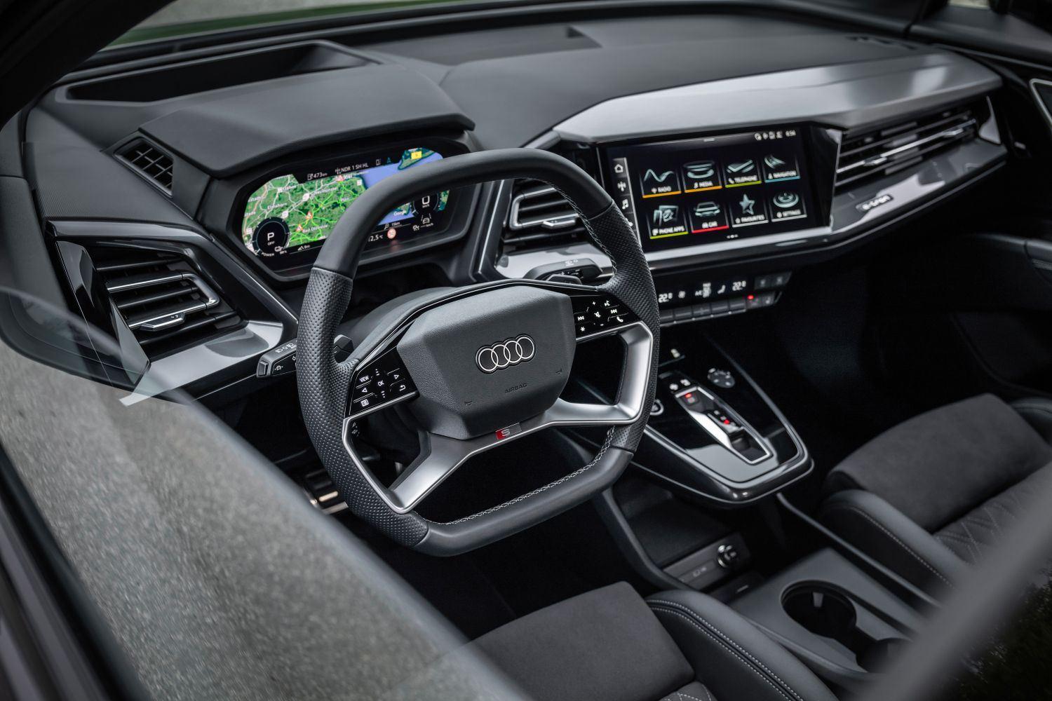 New Audi Q4 Sportback E Tron image of front drivers side interior digital cockpit