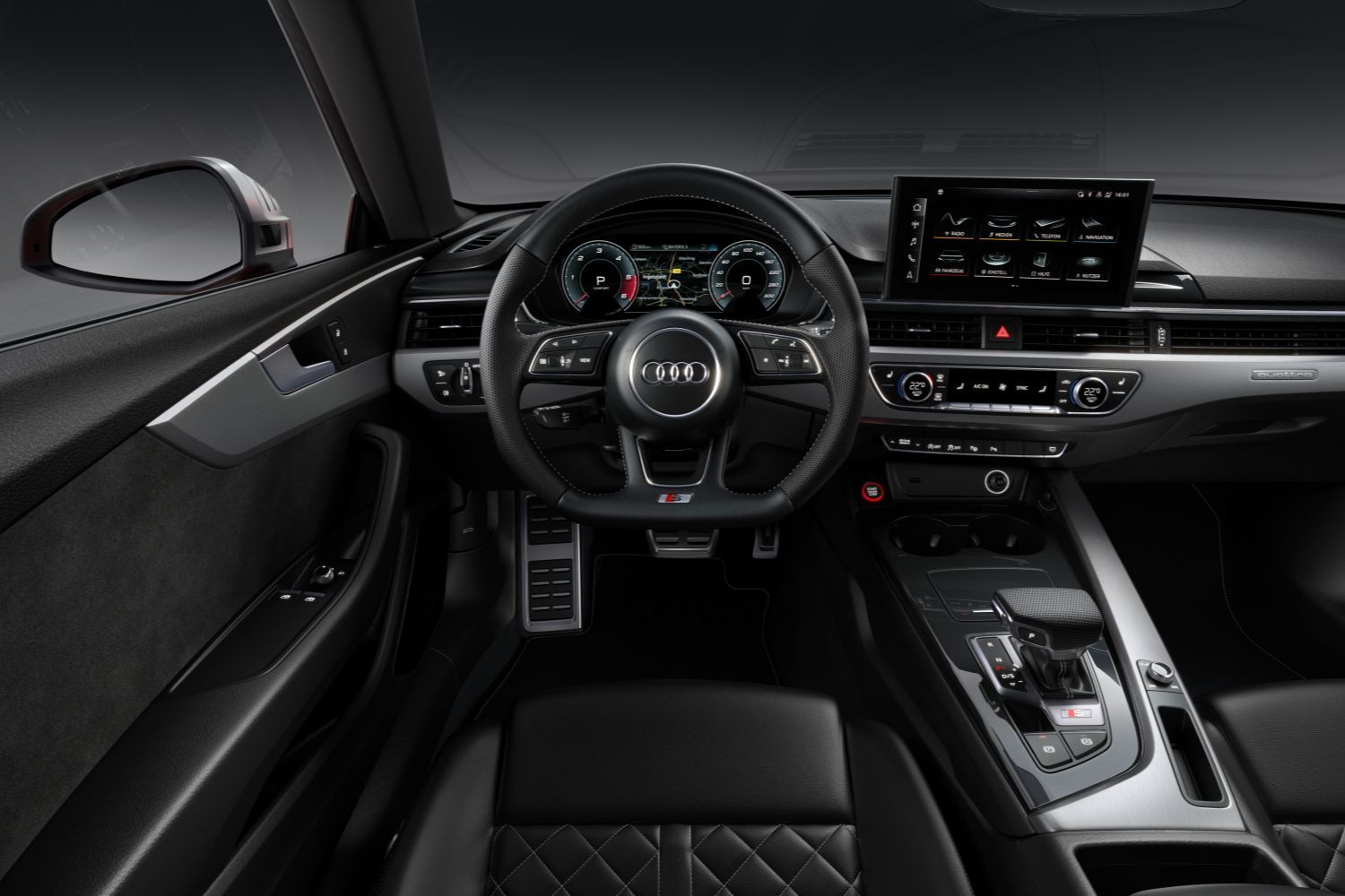 New Audi S5 Coupe front driver digital cockpit and infotainment system.