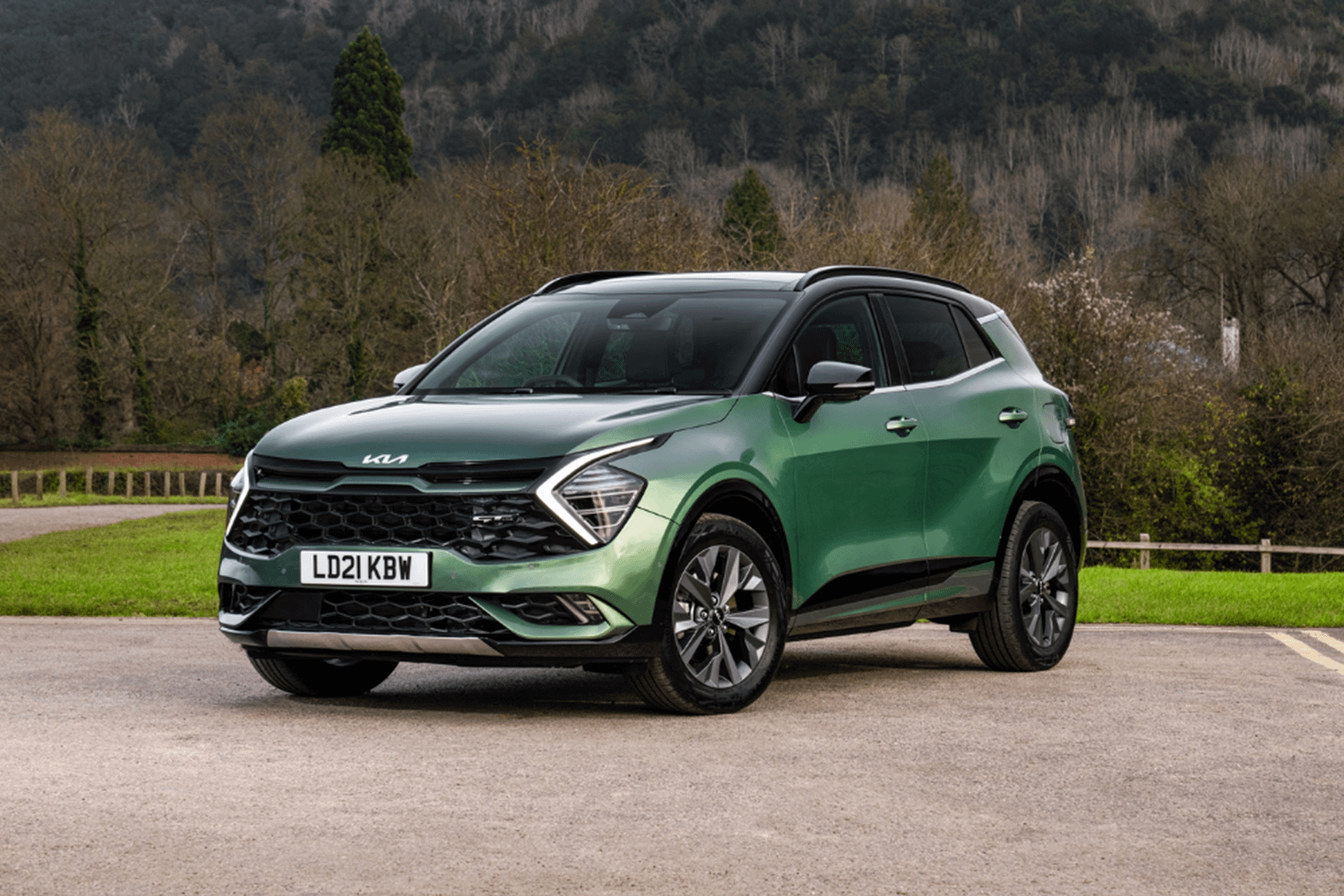 All-New Green Kia Sportage parked outside