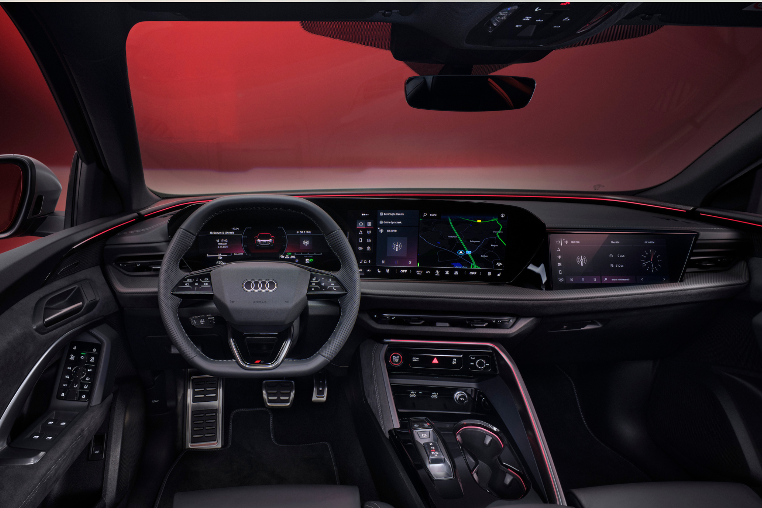 Black interior of the new Audi  SQ5 Sportback with red LED lights.
