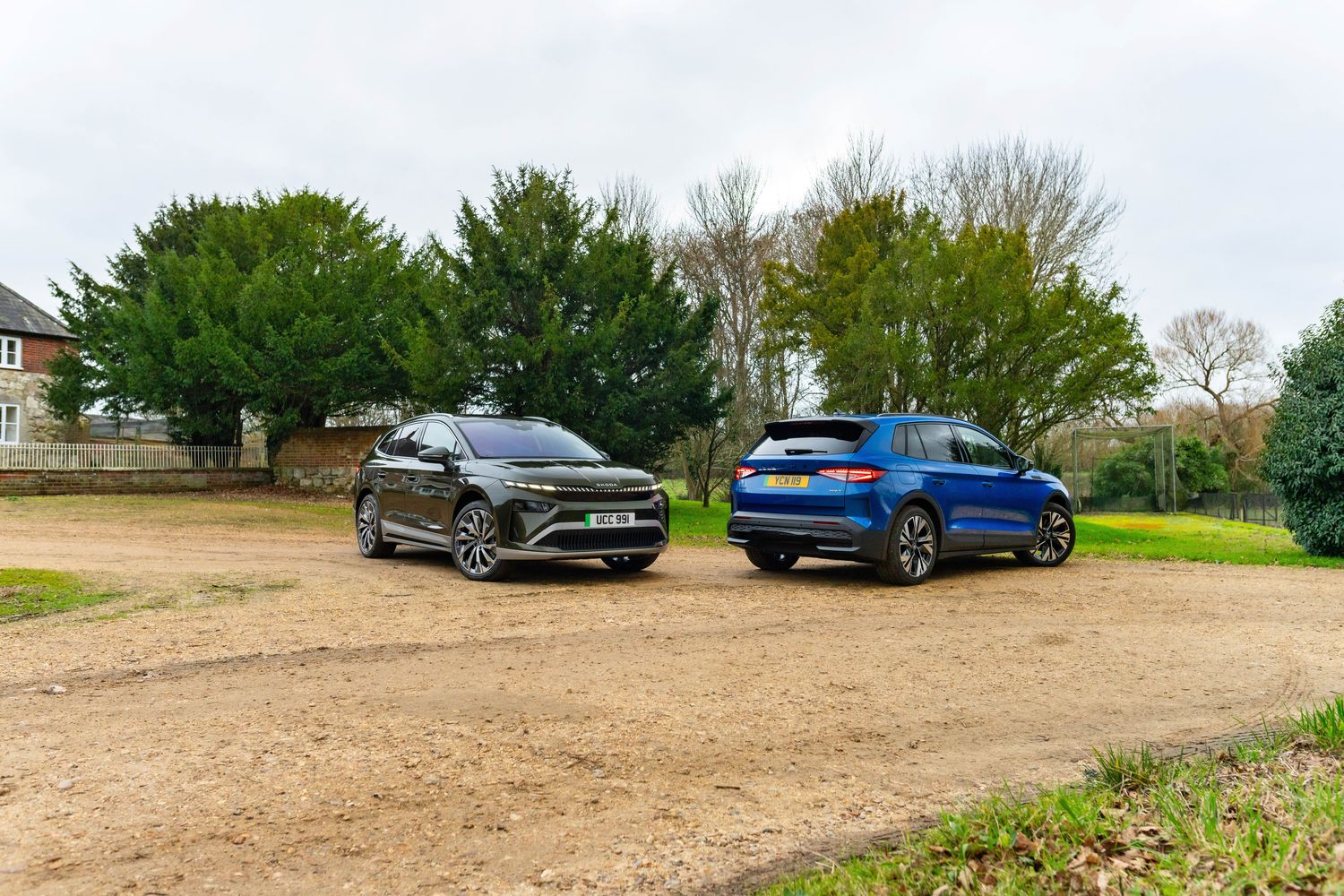 The new Škoda Elroq and Elroq Sportline, available at Agnew Skoda Belfast and Mallusk. Both models parked side by side in a driveway.
