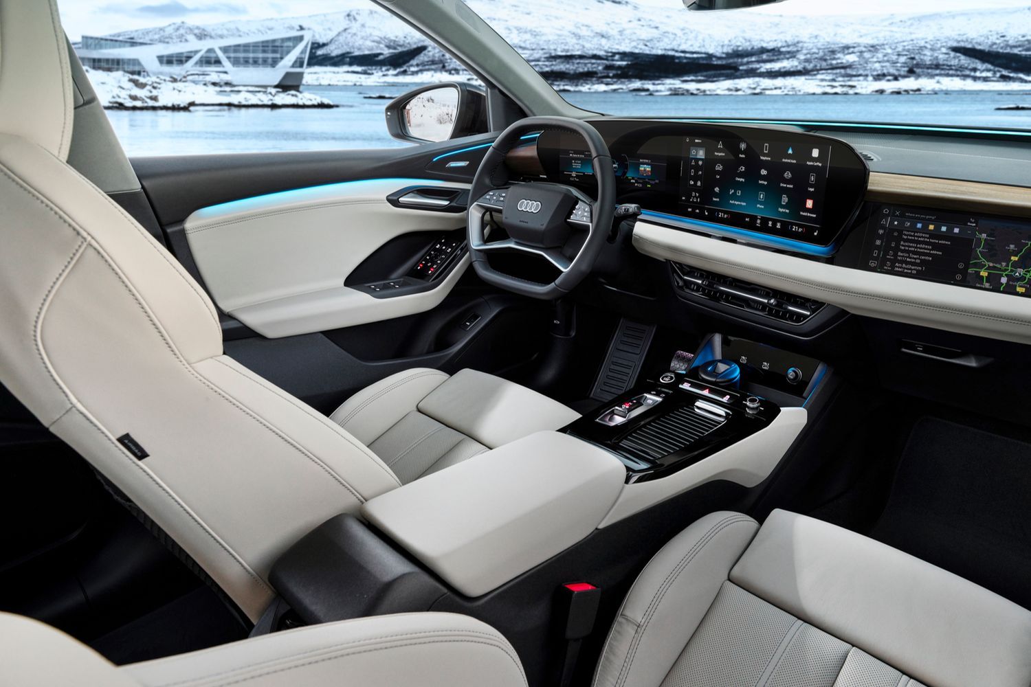 Close up of the new Audi Q6 e-tron's black and cream interior and driver display.