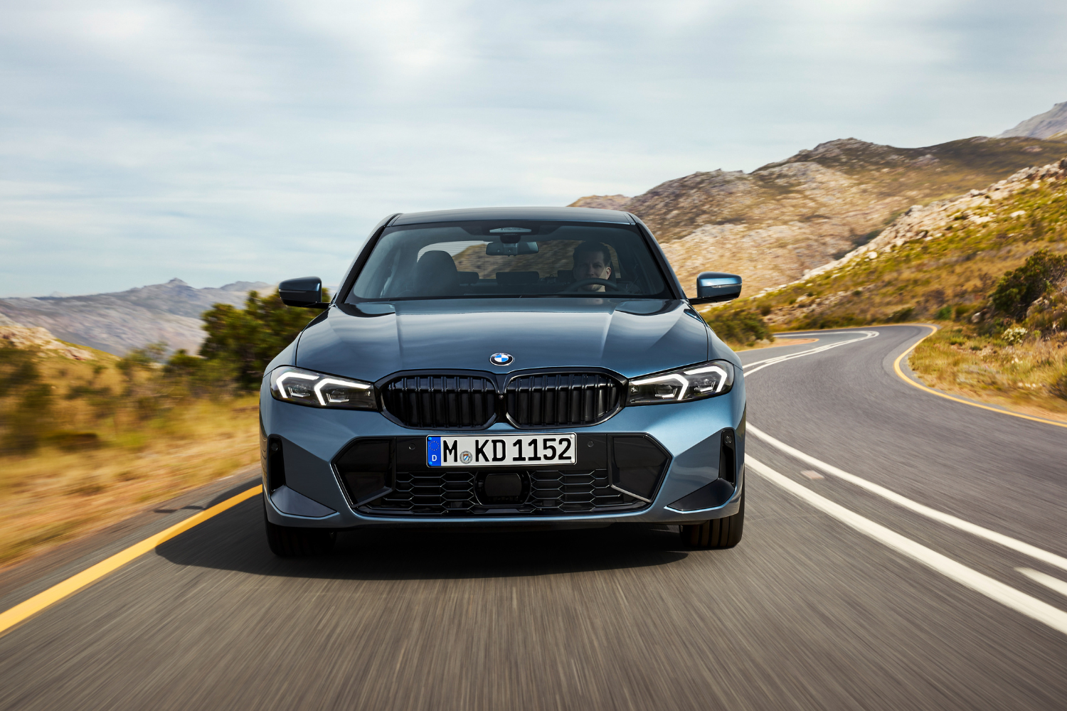 Front view of the new BMW 3 Series Saloon 2024 driving.