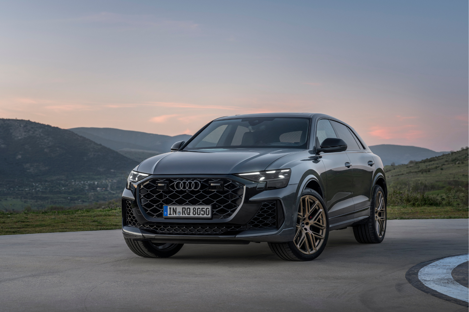 Front view of the newly updated black parked Audi RS Q8.