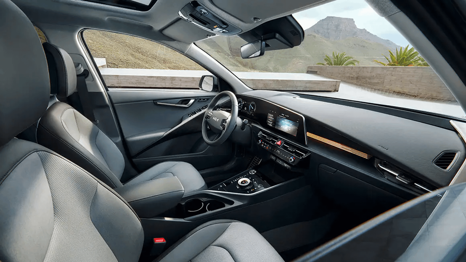 Grey Kia Interior steering wheel and infotainment