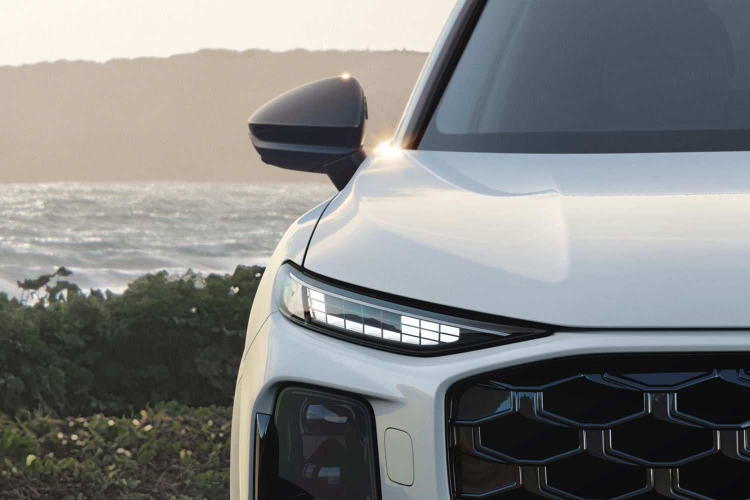 Close-up on the front of the new Audi Q3 SUV e-hybrid, available at Belfast and Portadown Audi.