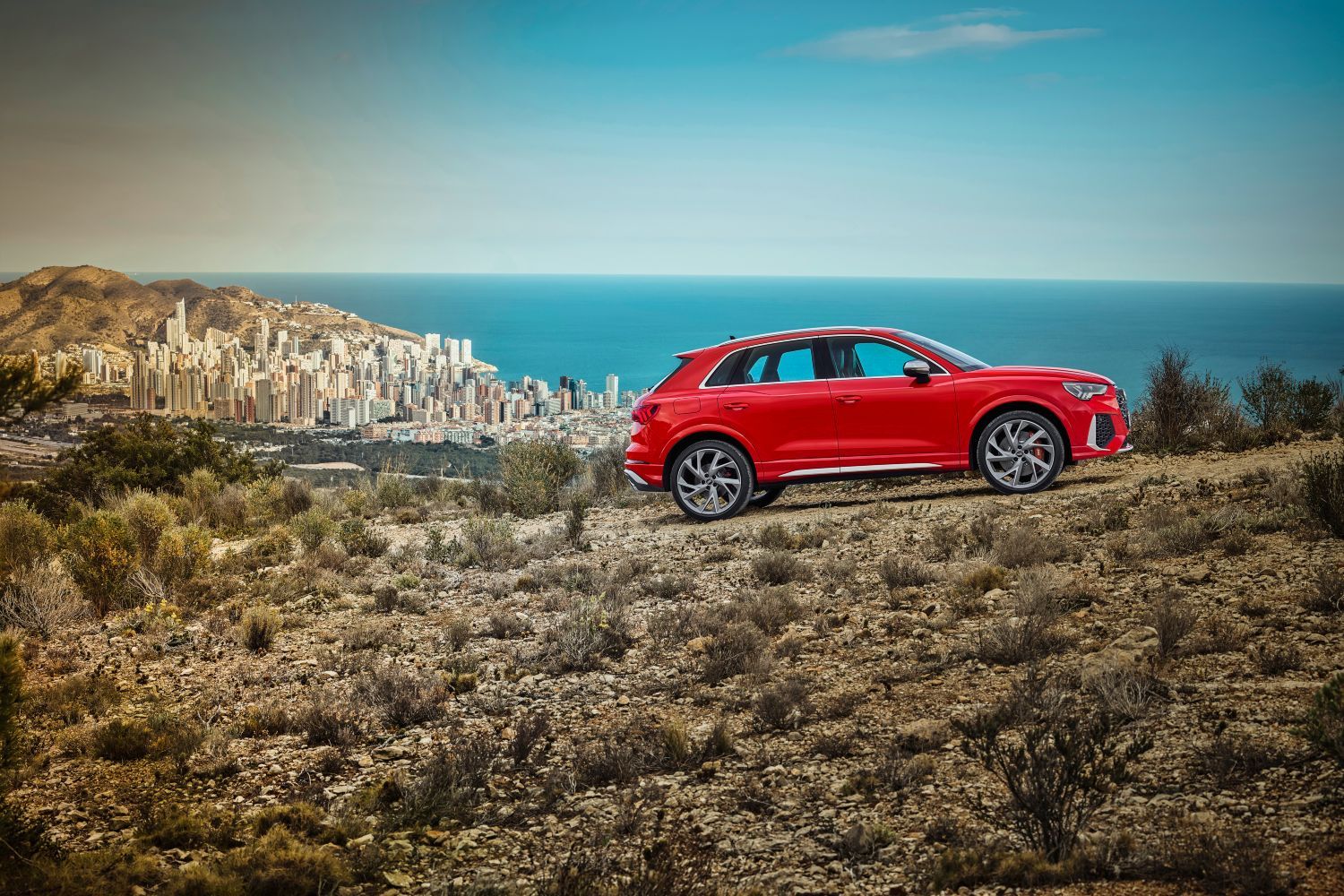 New Audi RS Q3 in red image of vehicle driving up hill