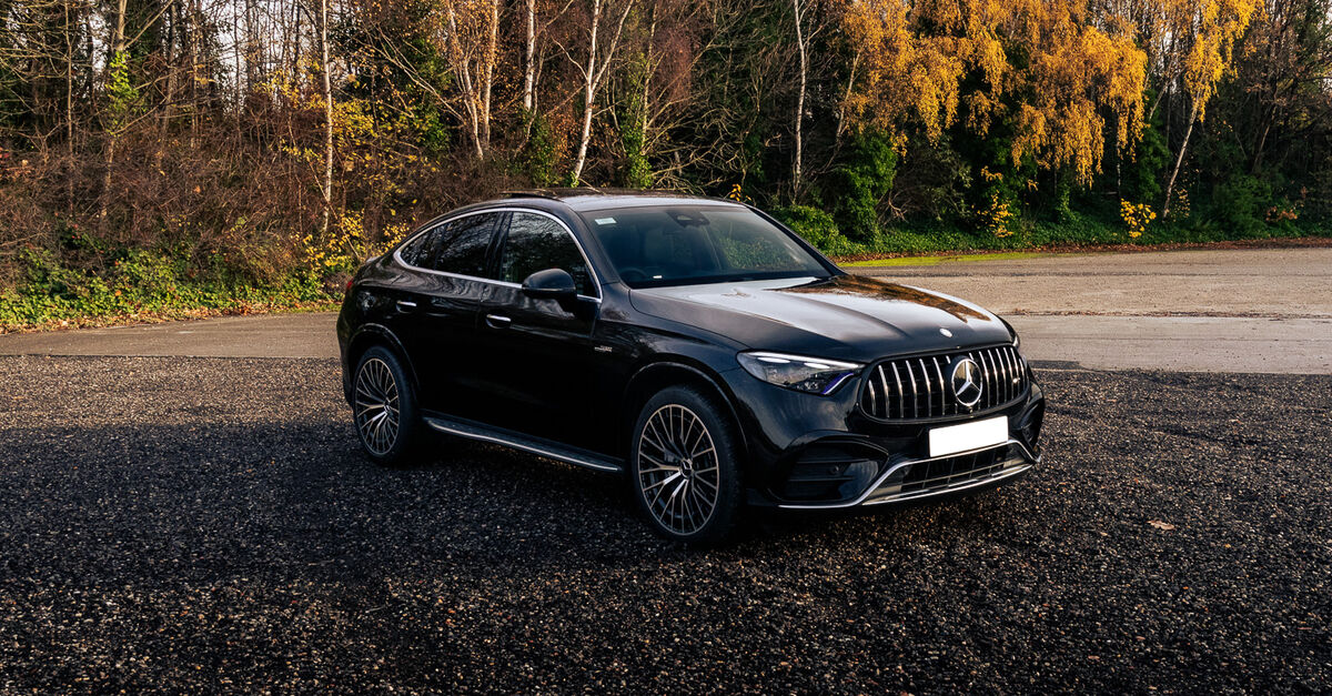 Mercedes-Benz GLC43 AMG parked in a car park surrounded by trees
