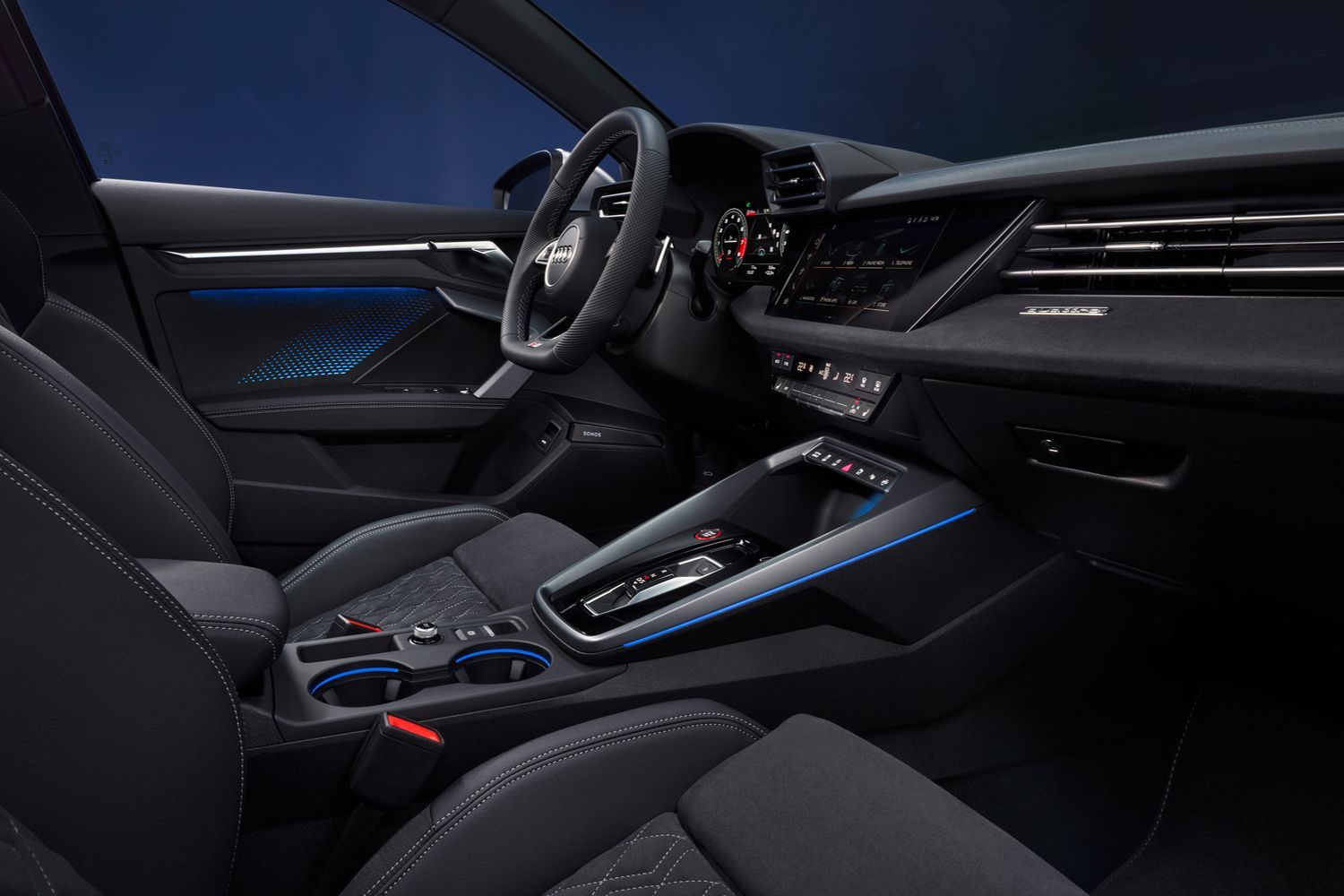The newly updated 2024 Audi S3 Saloon black interior, dual driver displays and blue interior lights.