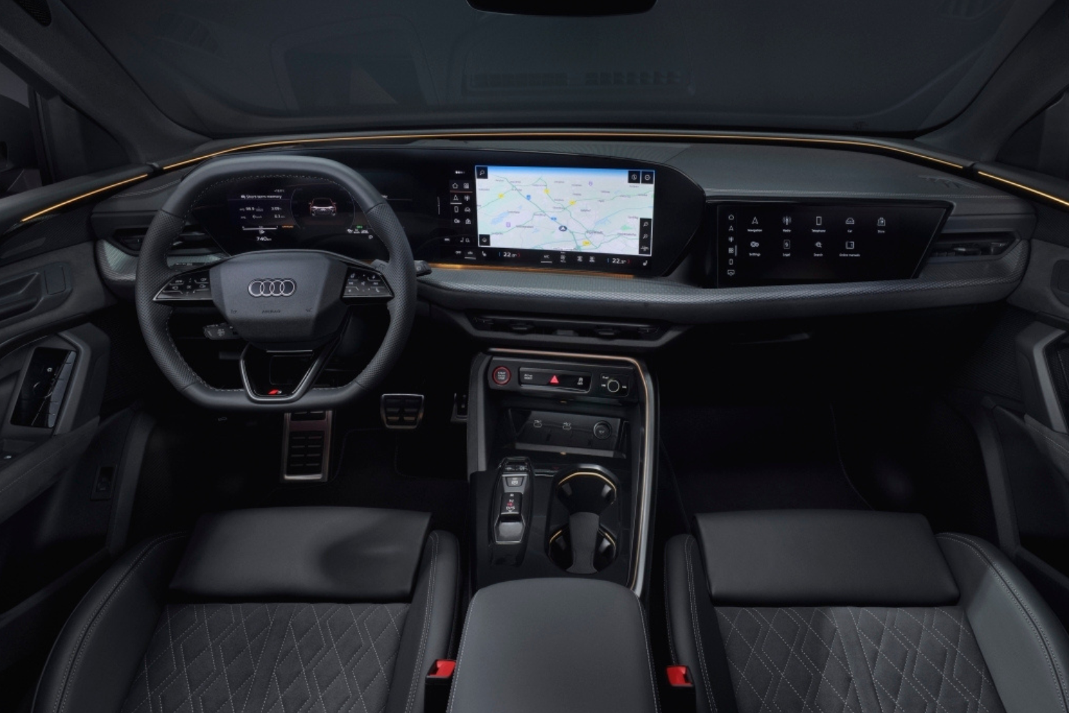 View of the black interior of the new Audi Q5 featuring driver displays.
