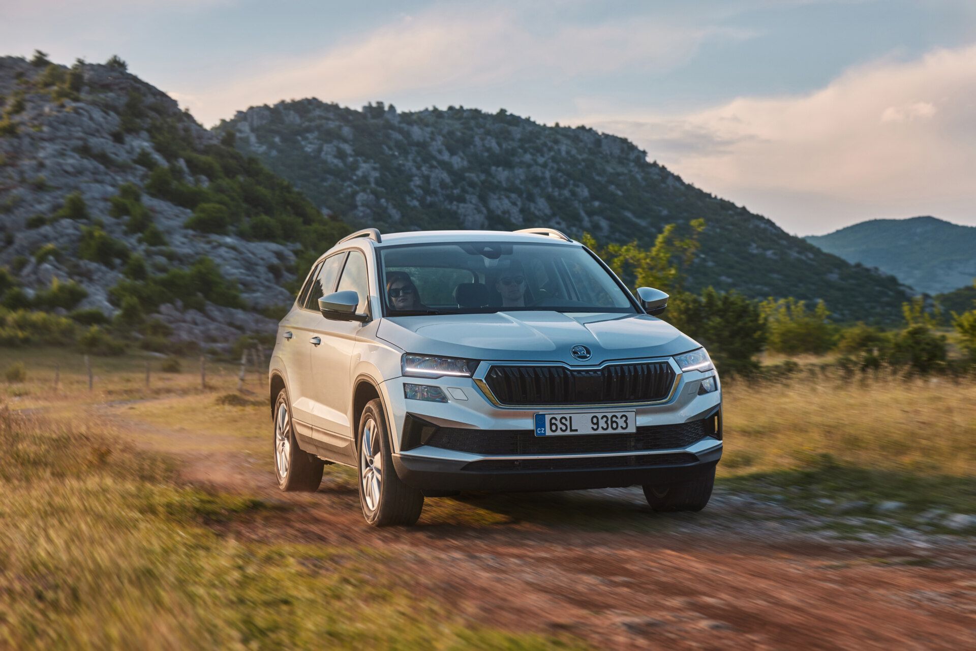 New Skoda Karoq, available at Agnew Skoda Belfast and Agnew Skoda Mallusk, driving on country road in Northern Ireland
