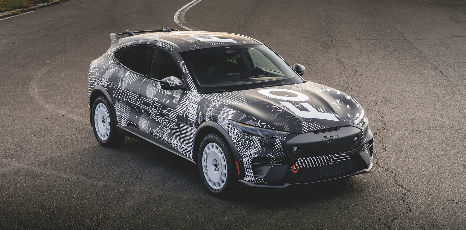Black Mach-E Rally covered in white decals