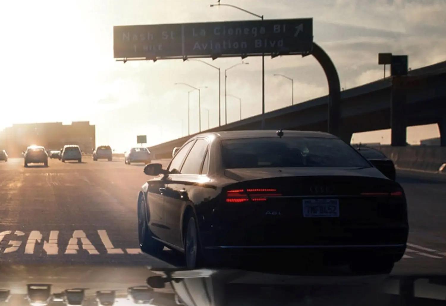 Image of Audi vehicle driving showcasing the Plug and Play app