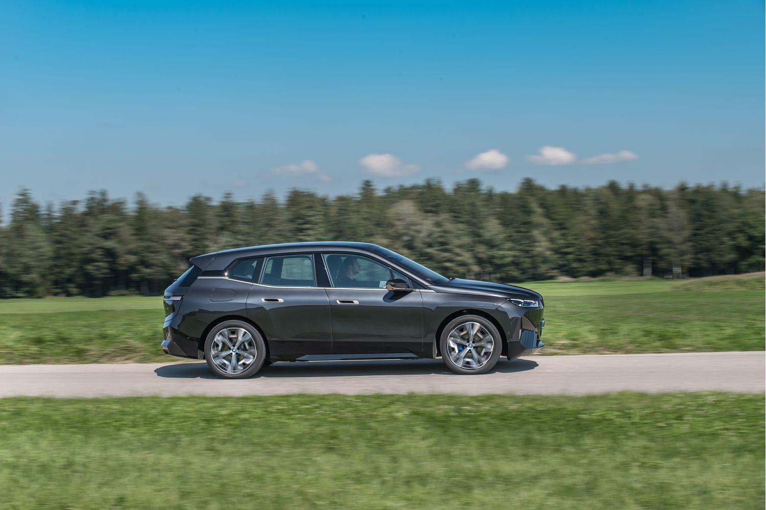 New BMW IX image of the exterior sideview of vehicle driving