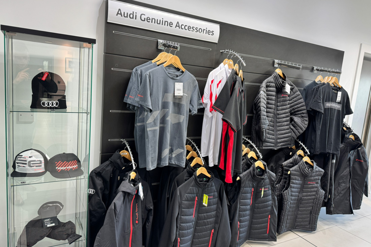 A wall full of Audi merchandise.