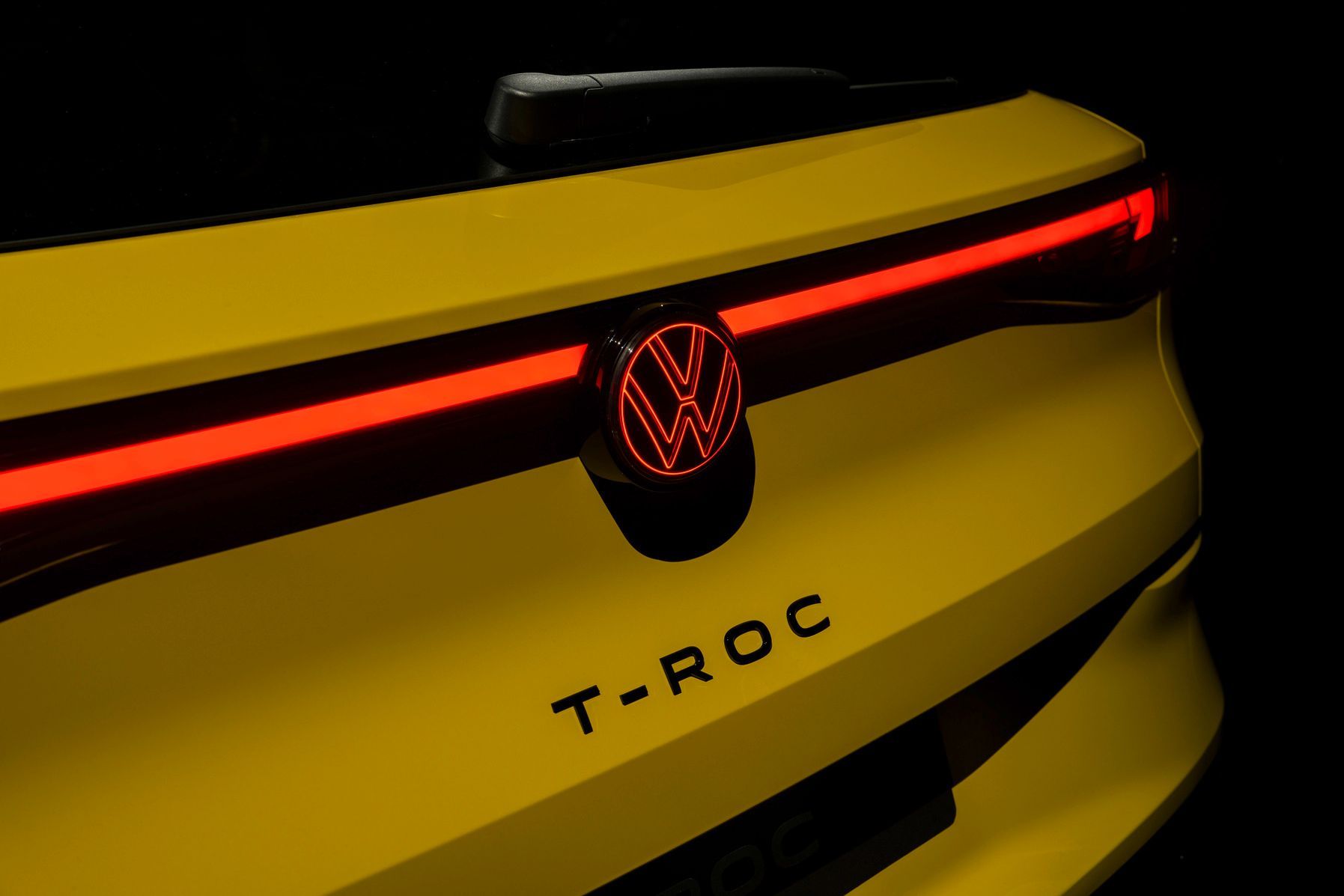 Volkswagen T-Roc rear boot with red lighting.