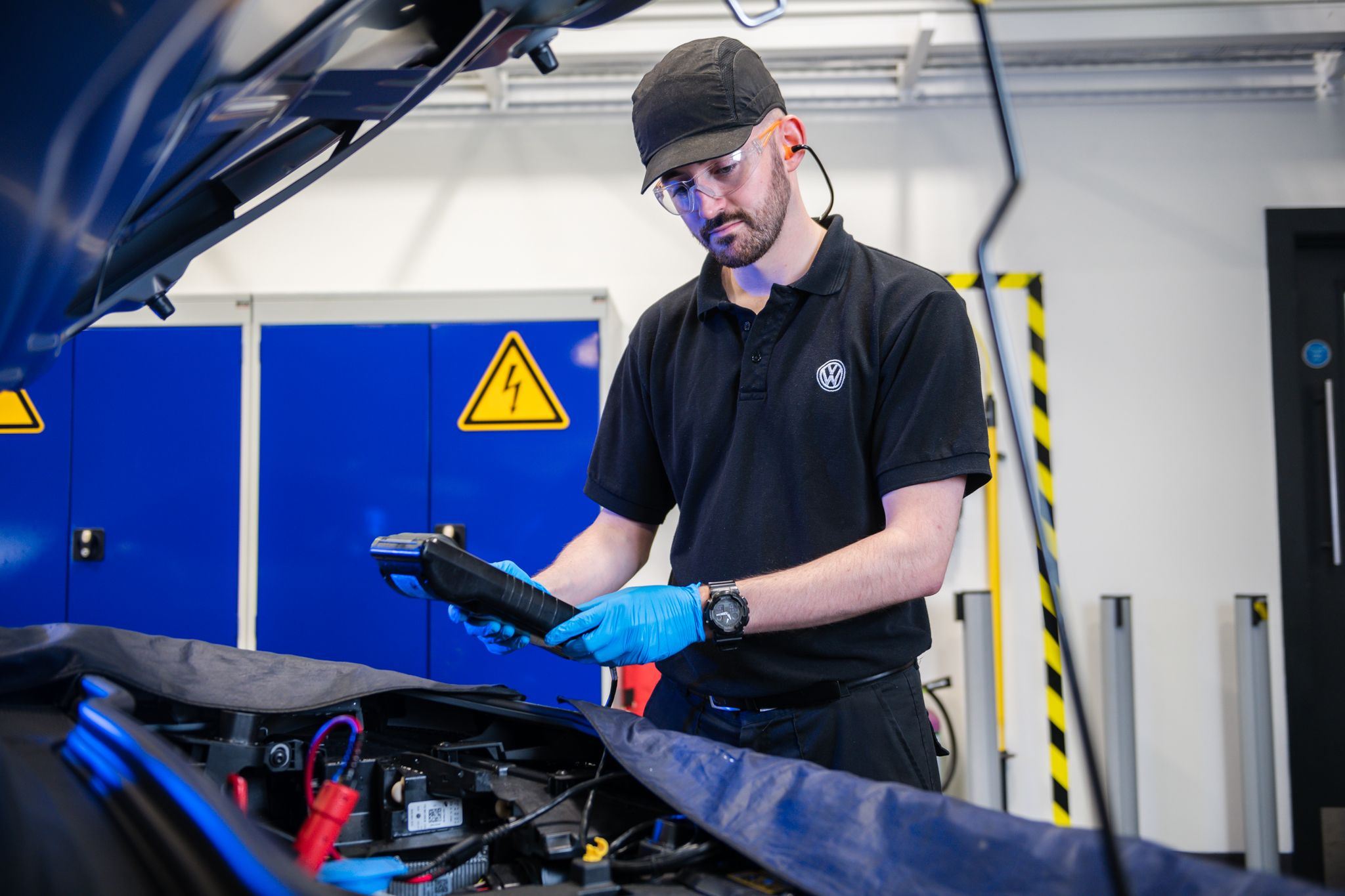 Volkswagen Technician completes battery state of health check as part of electric service plan
