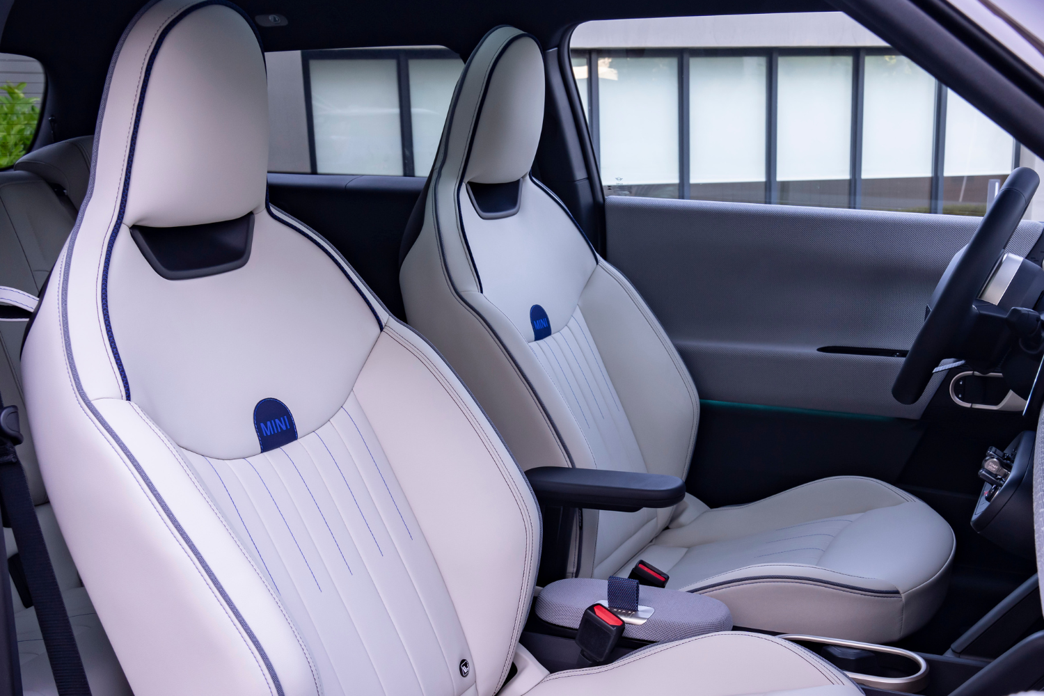 All-Electric Mini Cooper white interior seats.