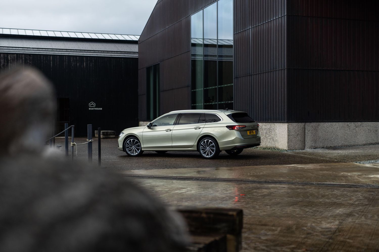Side view of the new Skoda Superb Estate. Parked by boathouse.