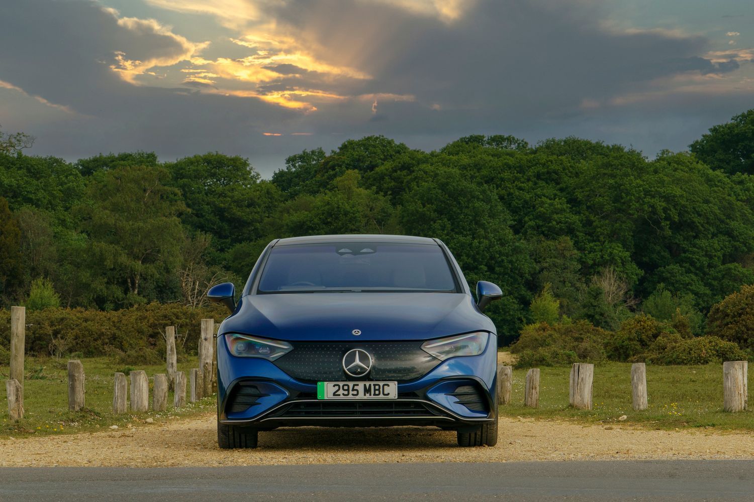 Blue Mercedes-Benz EQE Saloon front view.
