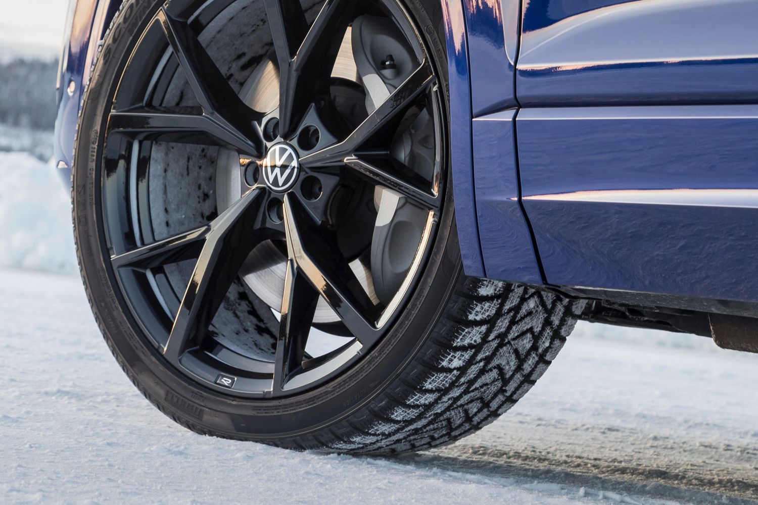 Volkswagen Golf tyres on snow after being checked for winter