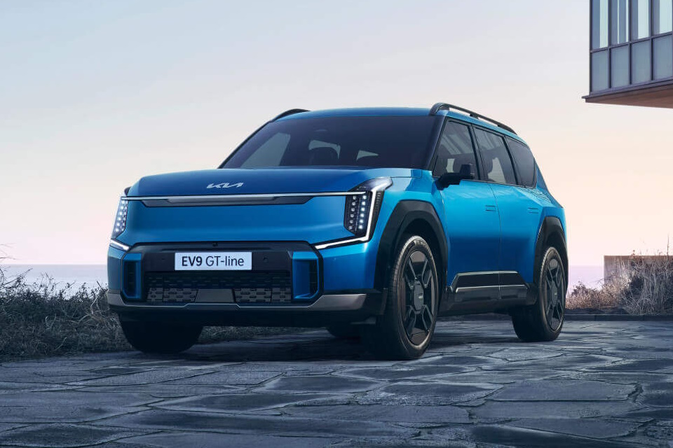 Blue Kia Ev9 Parked