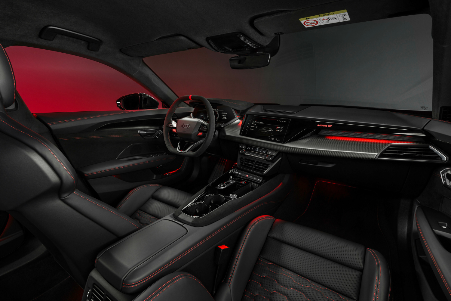 The new Audi e-tron GT 2024 black interior with red LED lights.