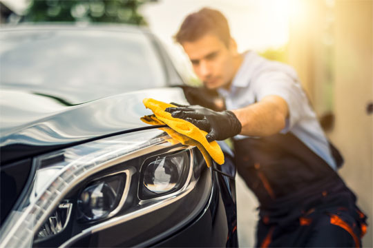 Man cleaning car professionaly