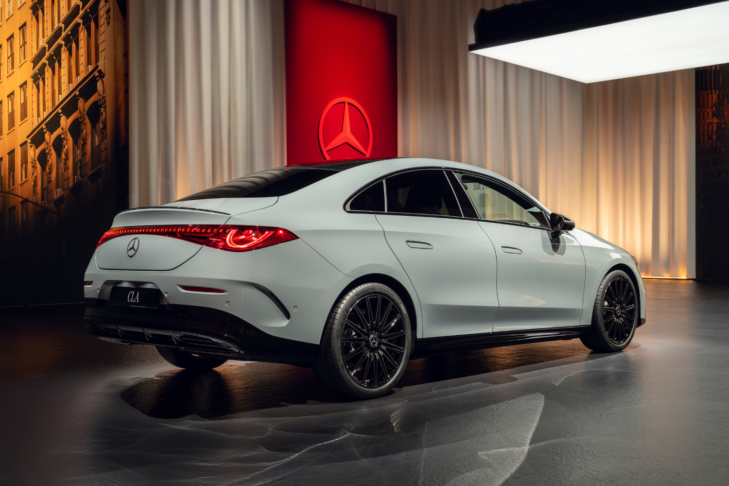Side rear view of the new Mercedes-Benz CLA Saloon.