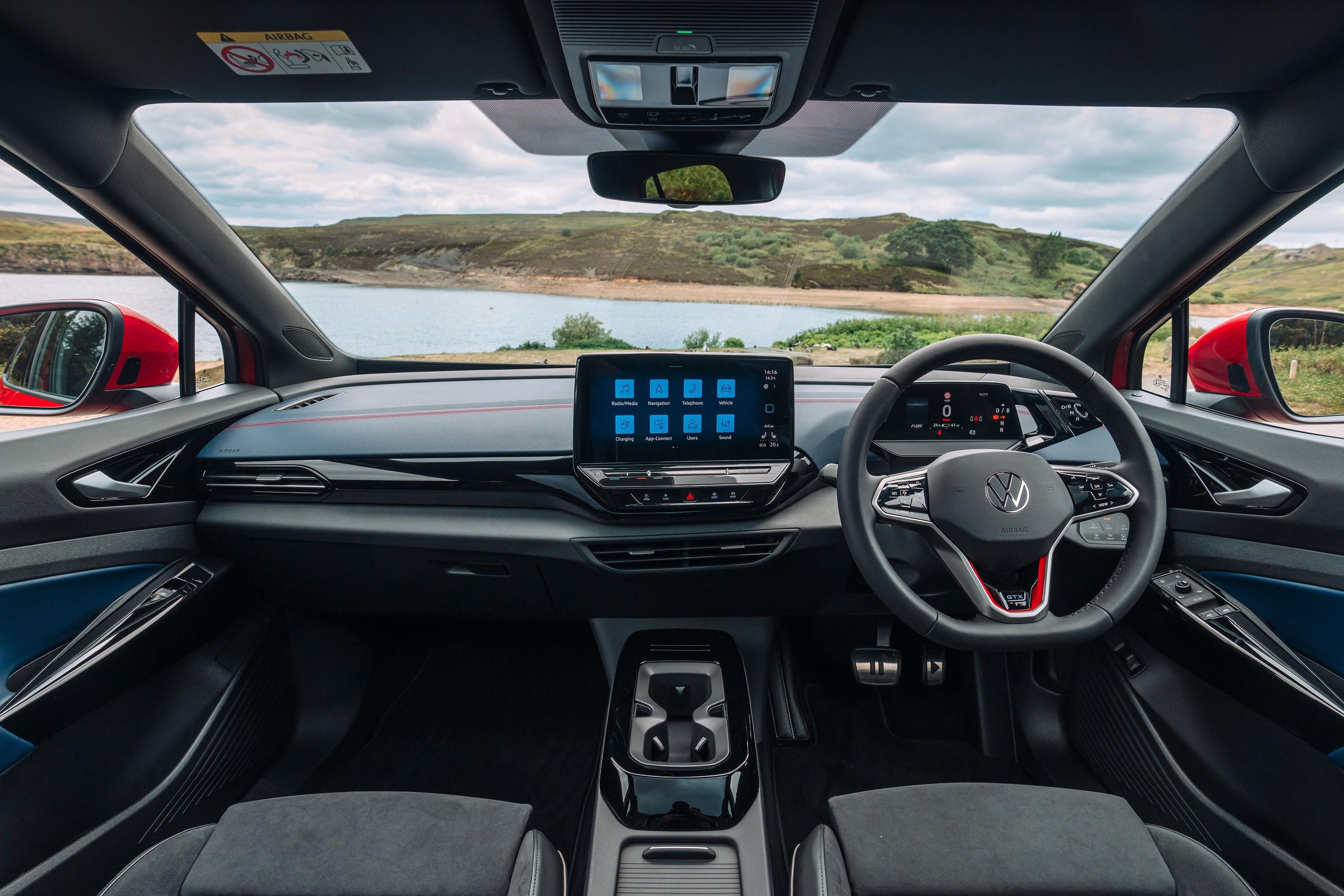 Interior view of the new Volkswagen ID.5, close-up of the front passenger seats, steering wheel and infotainment system