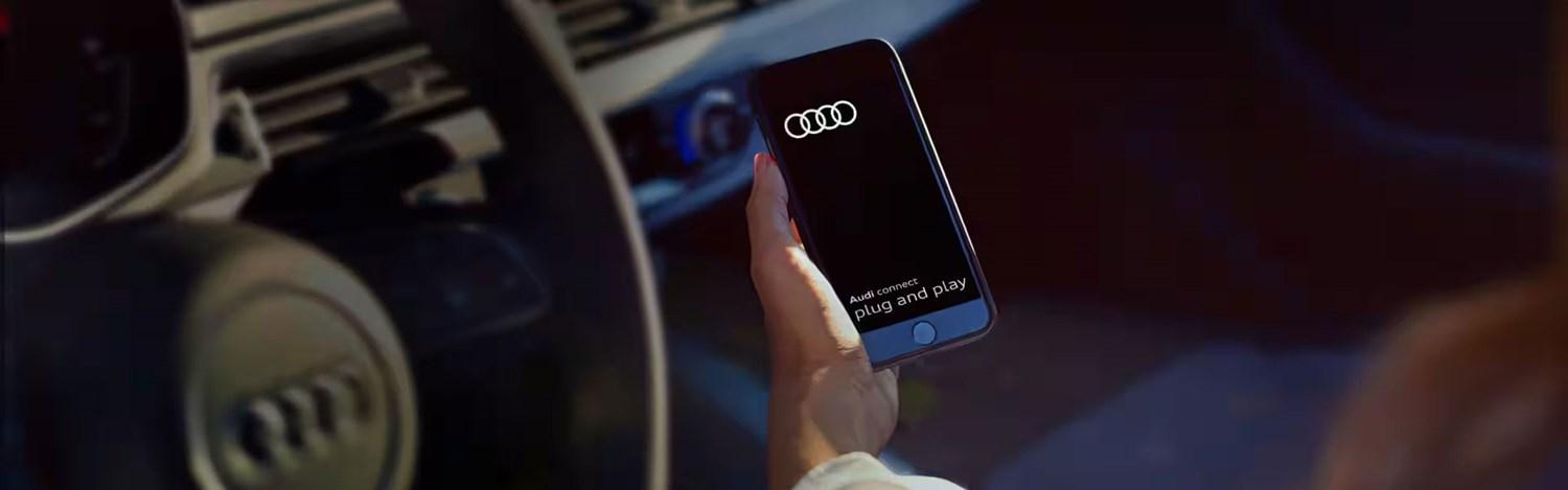 Image of Audi driver using the Audi Plug and Play app