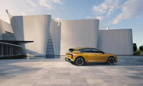 kia k4 by a building