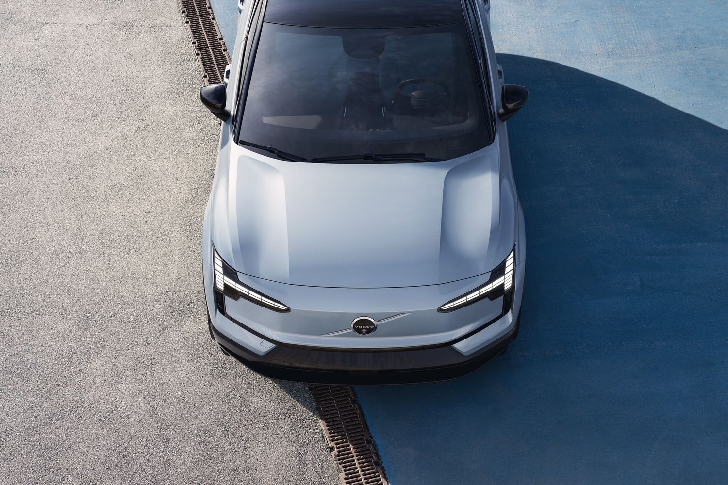 Top view of the Volvo EX30 in grey, parked in car park