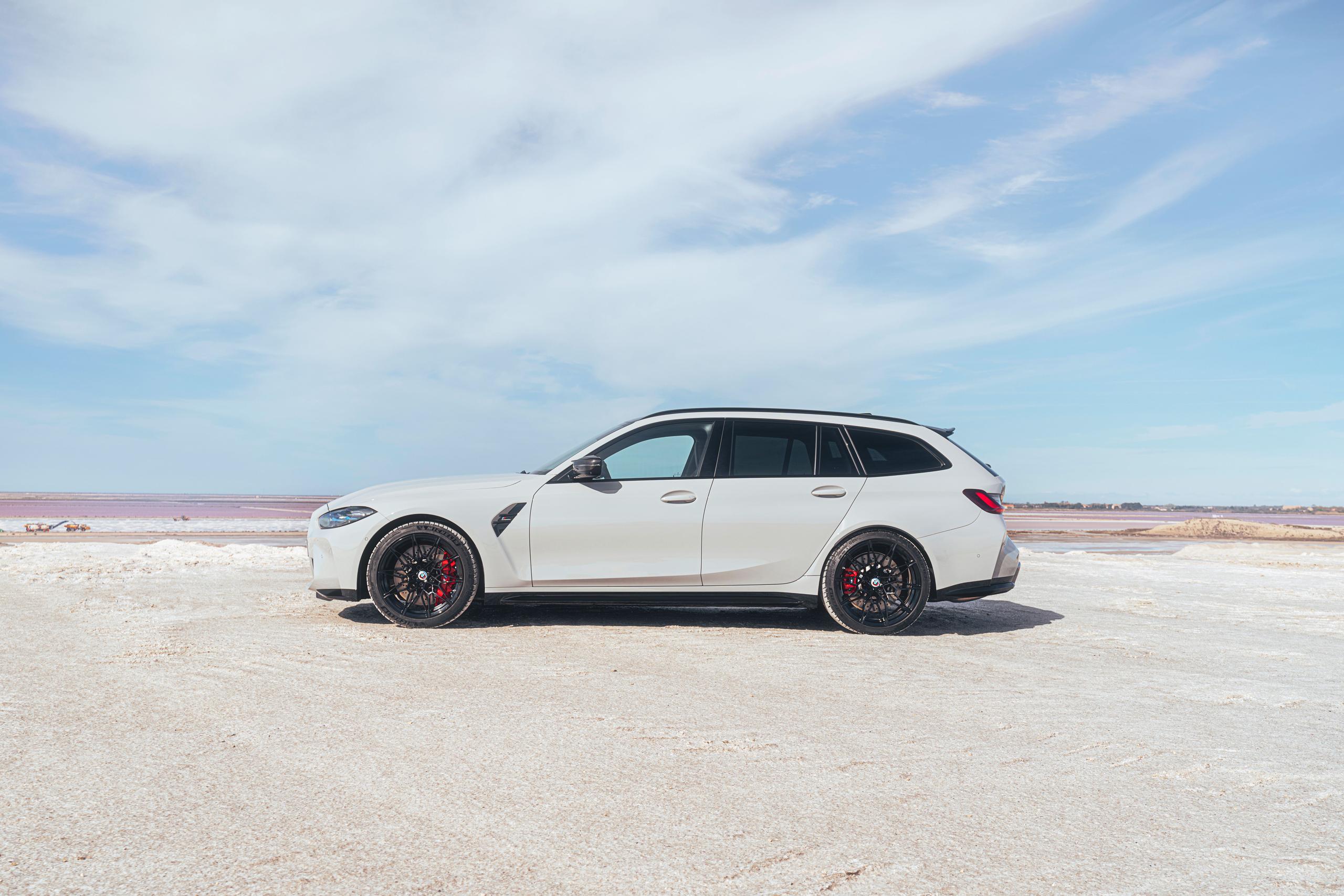 New BMW M3 Competition Touring image of the vehicles side