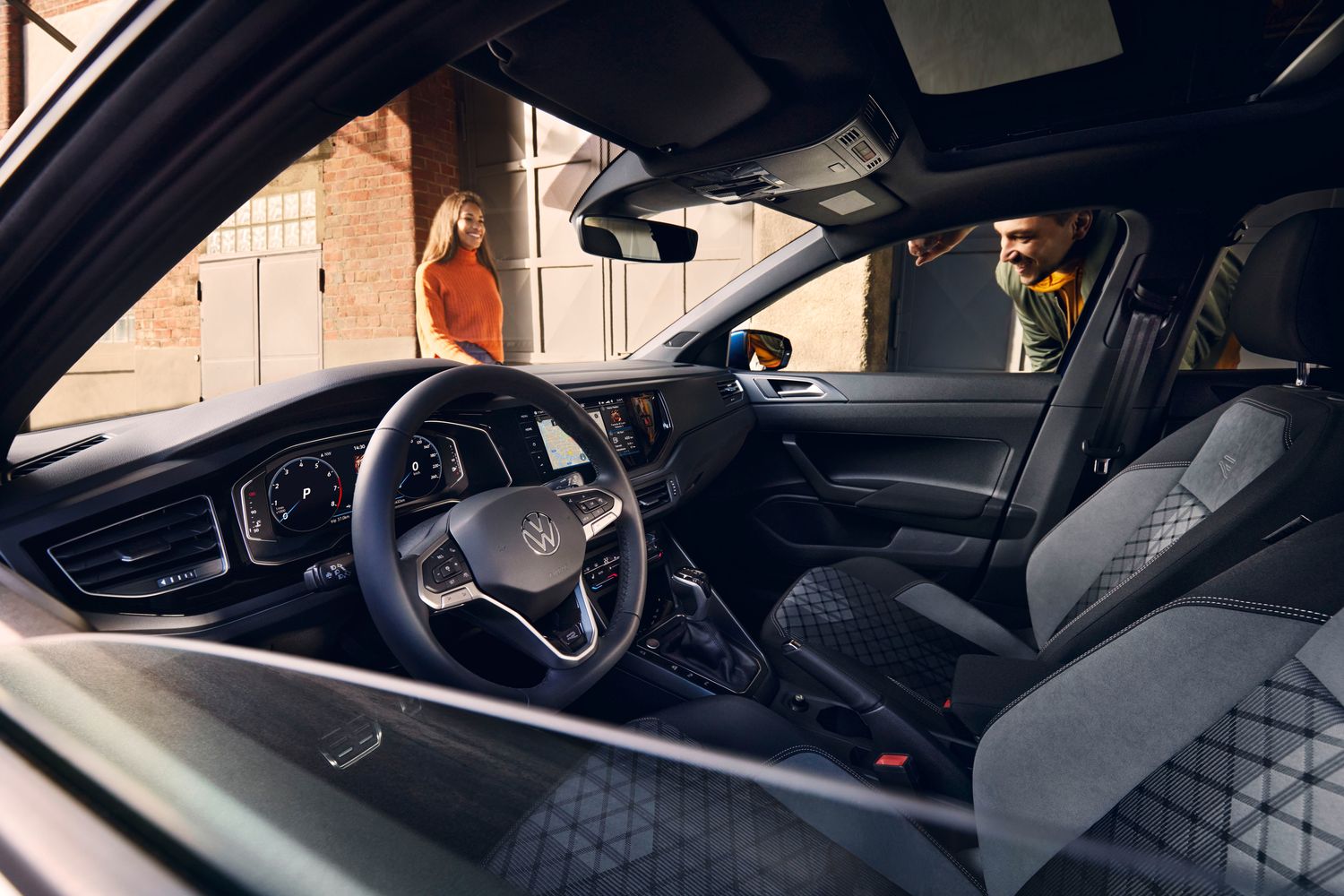 Interior view of the new Volkswagen Polo, close-up of front passenger seats, steering wheel and central console