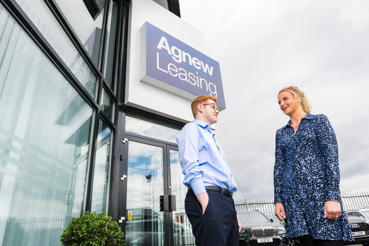 Agnew Leasing staff greeting customer outside our car leasing department in Belfast