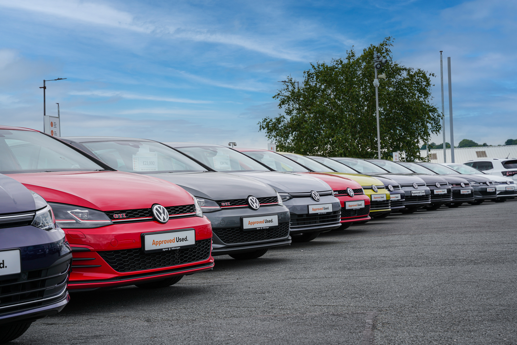 Line up of a variety of Golf Approved Used Vehichles.
