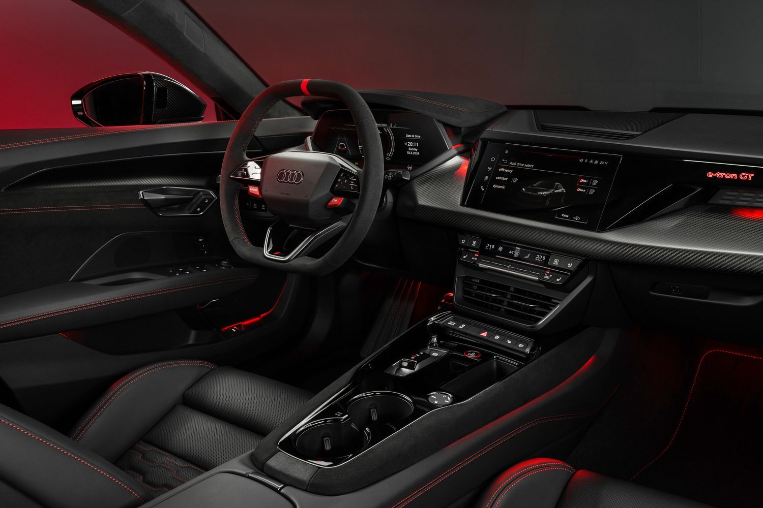 Audi RS e-tron GT black leather interior and driver displays.