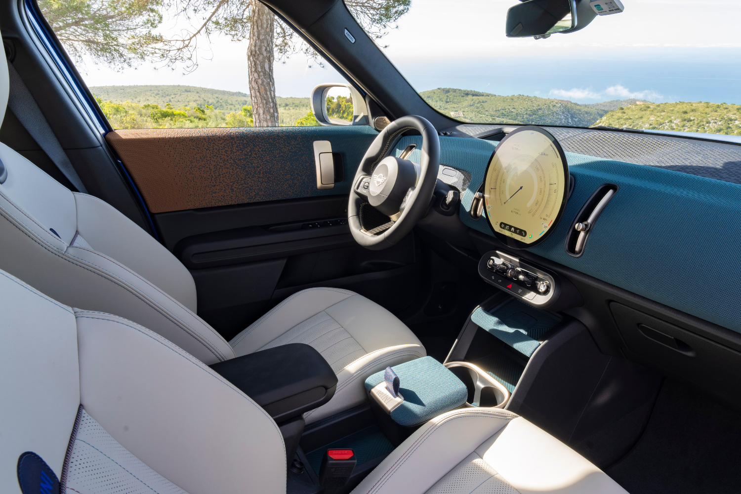 The cream and black interior of an All-Electric Mini Countryman.