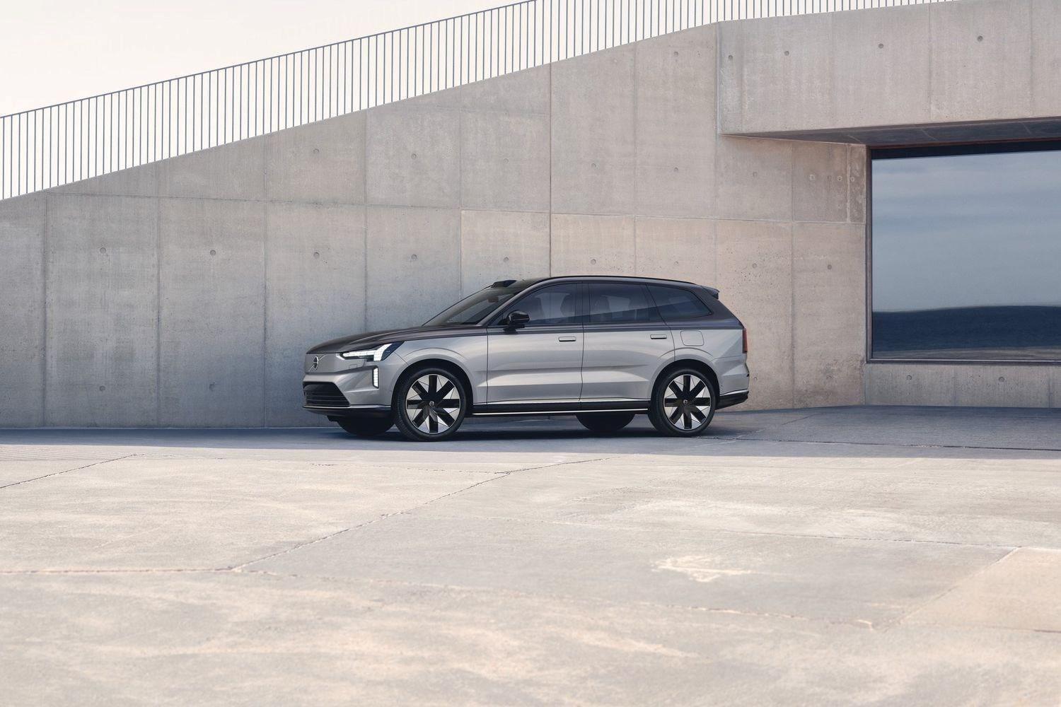 Side view of the new Volvo EX90 in silver, with neutral background