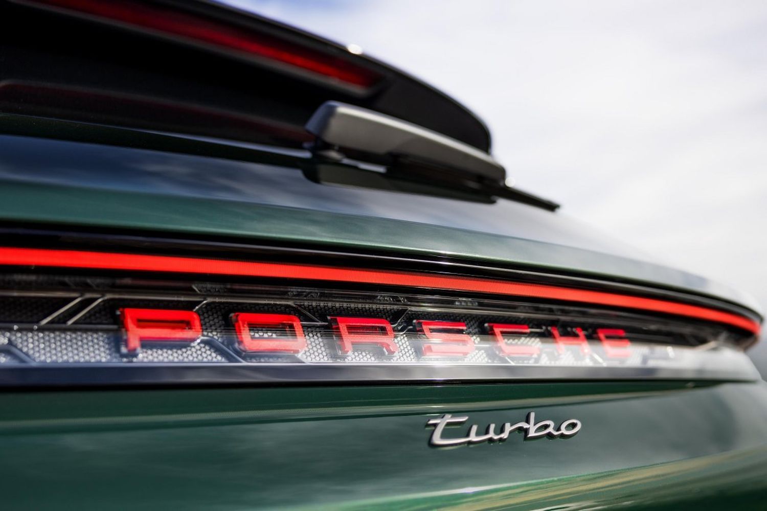 Close-up of the new Porsche Taycan Turbo rear with logo